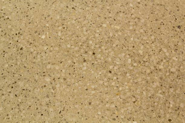 istock Concrete beige floor with multicolor marble and small natural crushed stones inserted. Pebbles textured background 1481614019