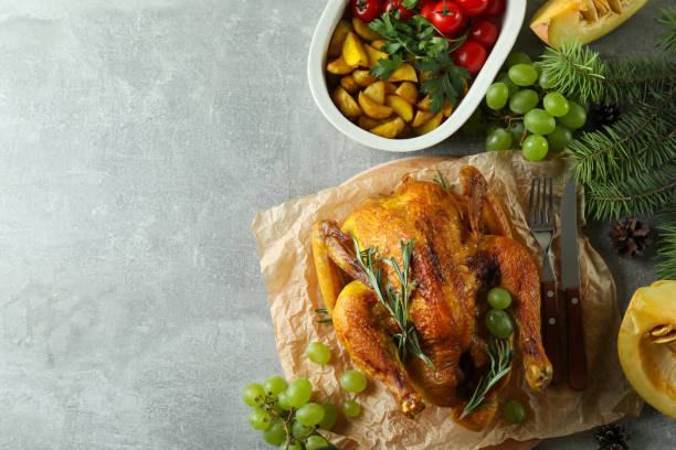 istock Christmas roast turkey concept on gray textured table 1481615633