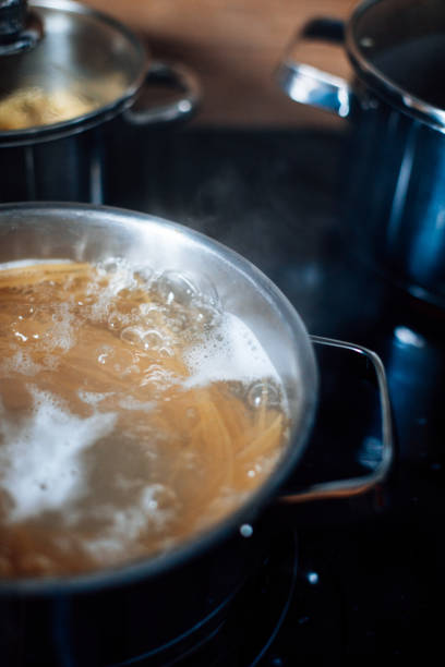istock Cooking  spaghetti in the boiling water 1481615987