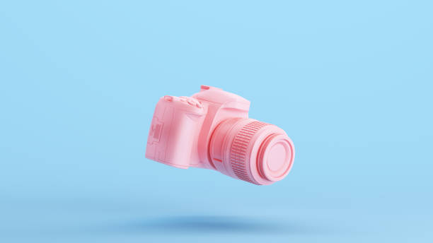 Pink Camera DLSR Lens Equipment Photography Technology Hobby Kitsch Blue Background