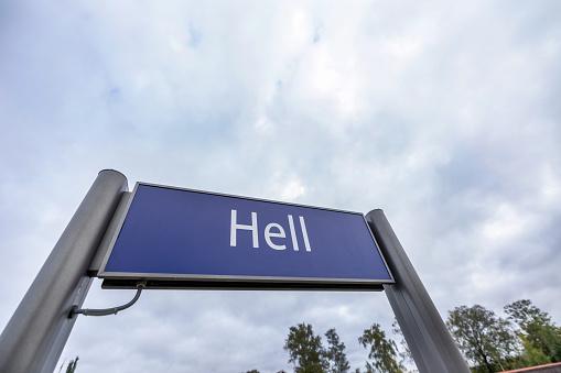 A view of the sign Hell in Hell city, shot at the railway station.\nHumour, famous place visited by tourist