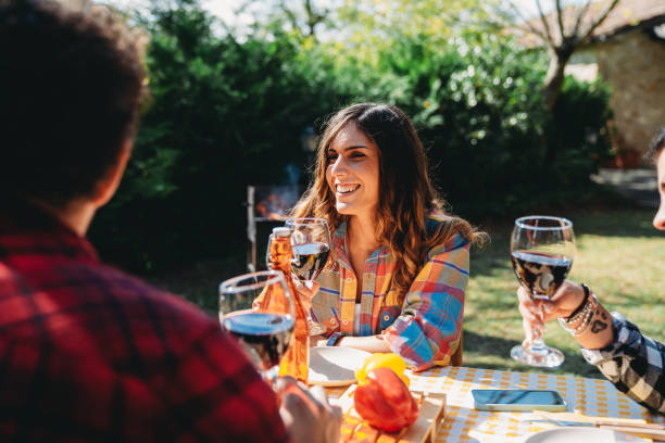 istock Friends talking together at vineyard countryside dinner party 1481620393