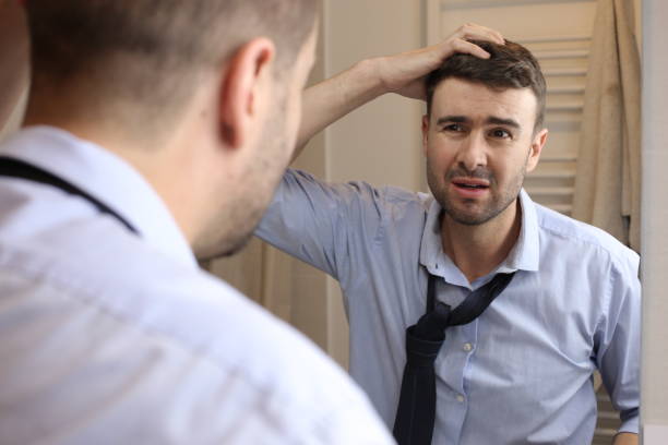 istock Stressed out businessman in the bathroom 1481622728