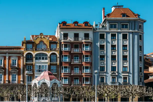 Photo of Traditional colourful building in Portugalete, Spain on the banks of the River Nervion