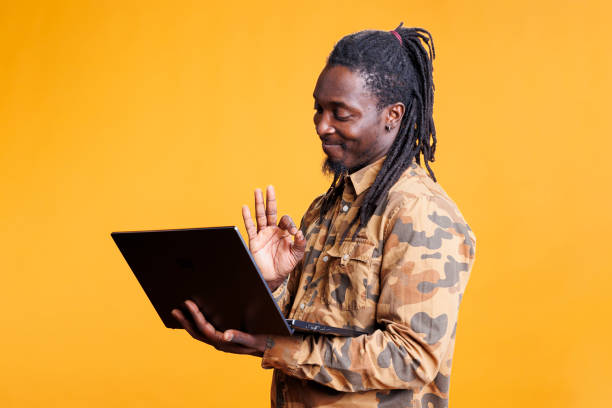 istock Man reading good news on laptop 1481624624