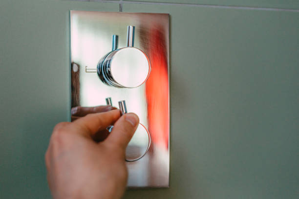 istock Regulating the water temperature for the bath or shower in the bathroom 1481626020