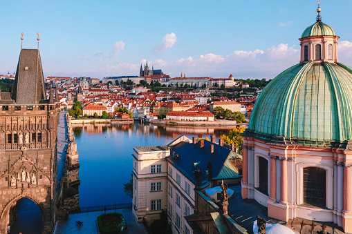 Aerial view of Old town bridge tower with Prague cityscape during sunset Czech Republic