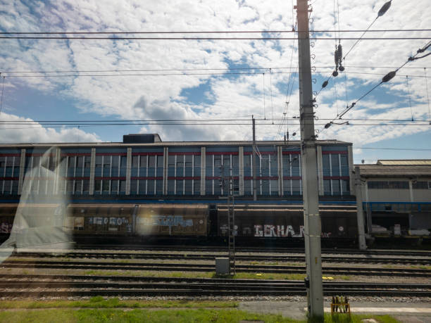 Salzburg railway station platforms in the morning. Buildings and passengers around the railway station at Salzburg, Austria.
