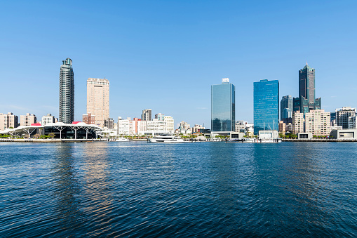 Kaohsiung, Taiwan- March 23, 2023: Modern building landscape along the Glory Pier in the port of Kaohsiung, Taiwan. such as 85 Sky Tower and Kaohsiung Port Cruise Terminal.