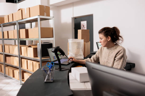 istock Storage room manager standing at counter desk 1481633839