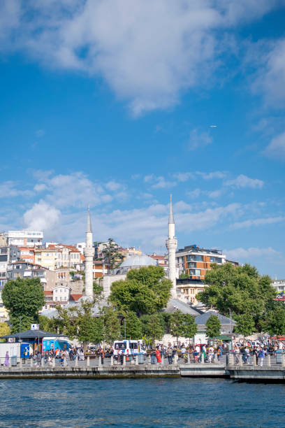 Istanbul, Turkey - June 29, 2023: Uskudar harbor and mosque in Istanbul, Turkey