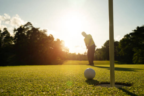 istock Blurred golfer playing golf in the evening golf course, on sun set evening time. 1481634672