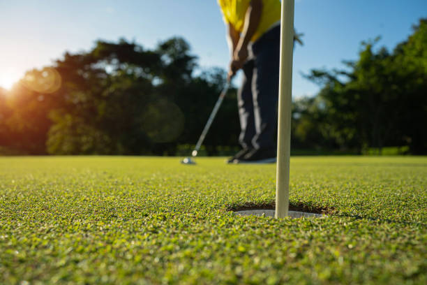 istock Blurred golfer playing golf in the evening golf course, on sun set evening time. 1481634715