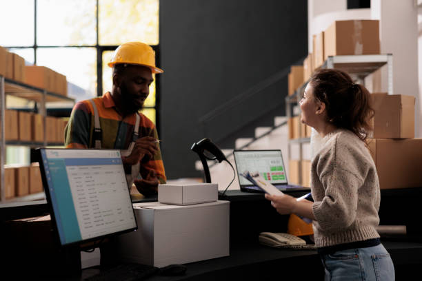 istock Diverse stockroom workers standing at counter desk 1481635562