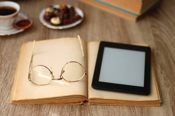 istock Books, Glasses, Tablet, Tea, Chocolate, Cookies and Candles 1481635847