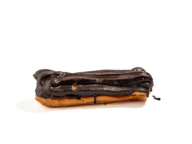istock Delicious chocolate eclairs isolated on white background. 1481636859