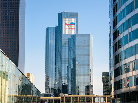 Puteaux, France - April 9, 2023: General view of the Coupole tower which house the head office of the french oil company TotalEnergies in Paris La Defense business district.