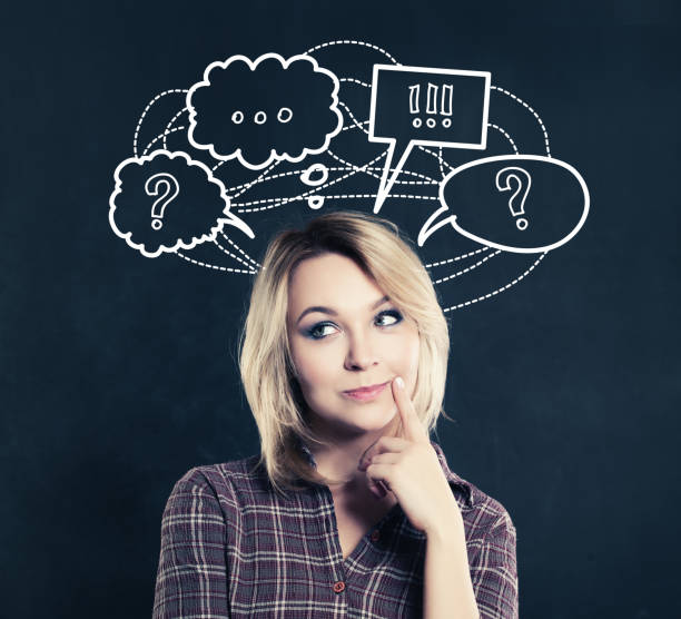 istock Thinking Woman on Dark Background with question mark icons 1481645514