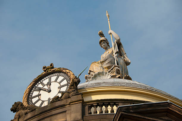 A majestic statue of Britannia, spear in hand,gazes down from the roof of Liverpool Town Hall onto the  streets of this bustling City,an important centre of commerce,and the Arts and the birthplace of the Worlds greatest pop group, The Beatles.