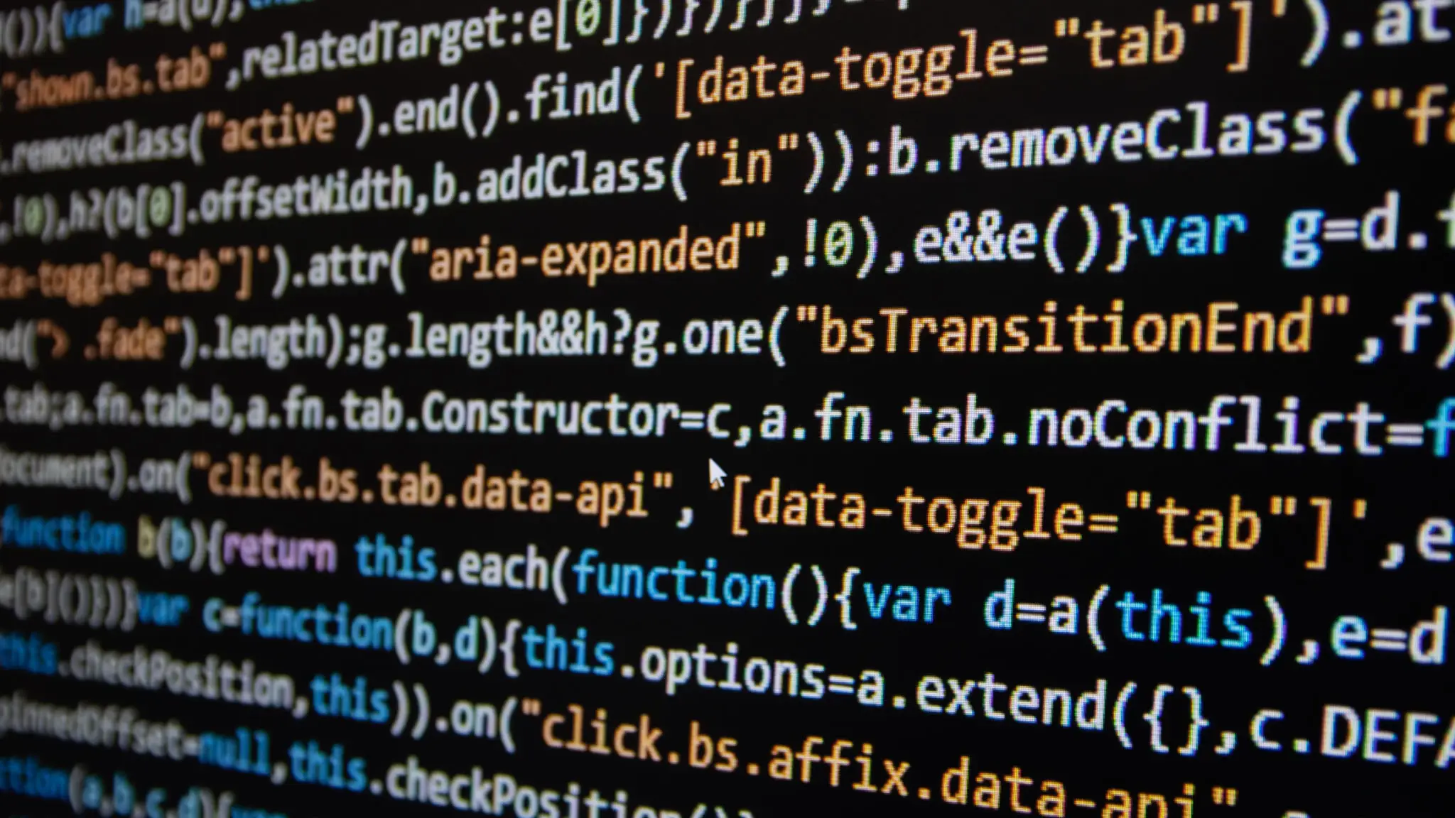 컴퓨터와 함께하는 고랭 프로그래밍 기초 2 Software development. Programmer coding on the computer monitor. Close-up. Computer program code on a black background. High quality photo