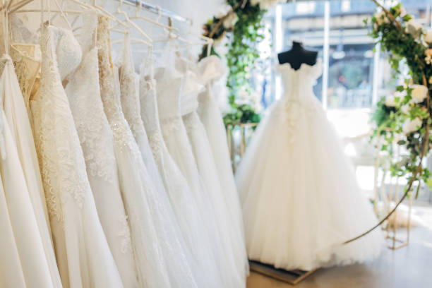 Bridal dresses in the bridal shop Bridal dresses in the bridal shop bridal boutique stock pictures, royalty-free photos & images