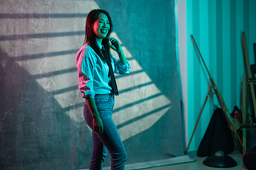 Beautiful modern Japanese female in studio.