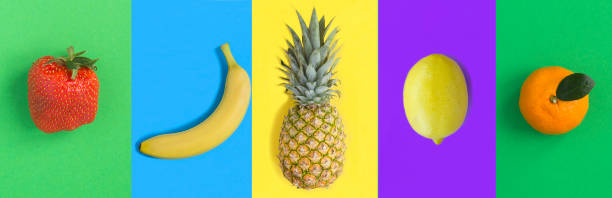 Collage of berry and fruit on the colored background. Close-up.