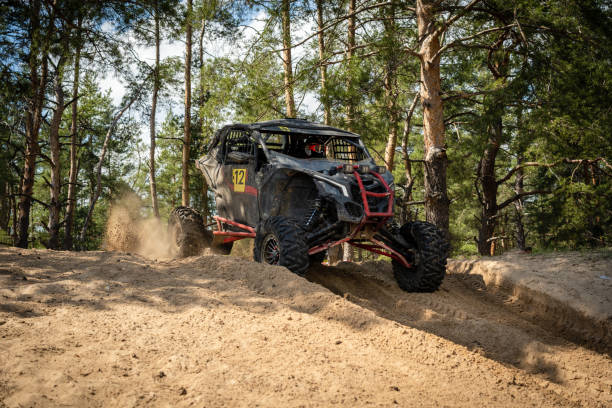 istock UTV, ATV off road driving in sandy open area. Buggy extreme riding 1481655340