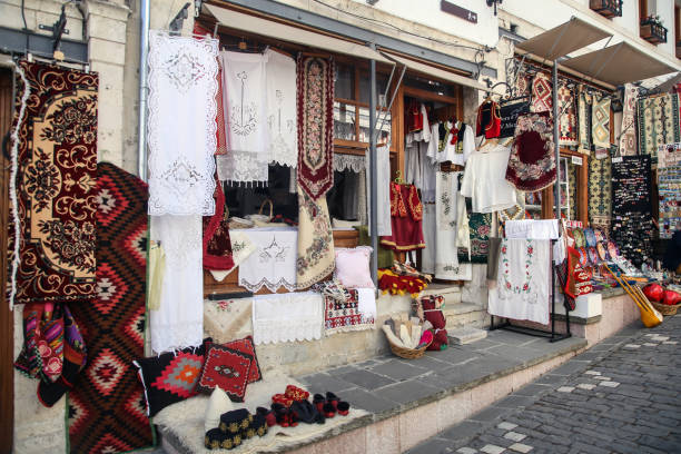 Antalya, Turkey - November, 3, 2023:  Man shopping in the traditional shop in the old town of Antalya.