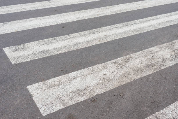 istock View of zebra pedestrian crossing. Black and white 1481656395