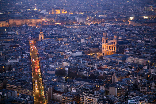 High angle view of Paris, France at dusk - Rue de Rennes and church Saint Sulpice.