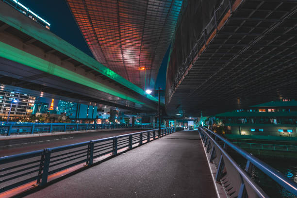 istock Highway bridge and city lights at midnight in Tokyo 1481661819