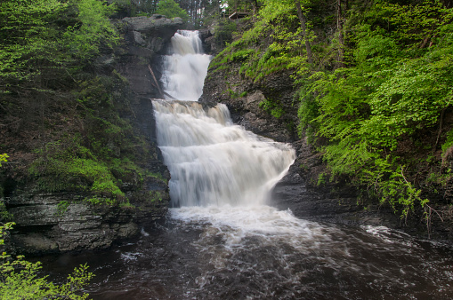 the highest waterfall in Pennsylvania, raymondskill falls on a springtime cloudy day.