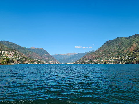 Beautiful lake Como view from the boat in Lombardy, Como In Italy.