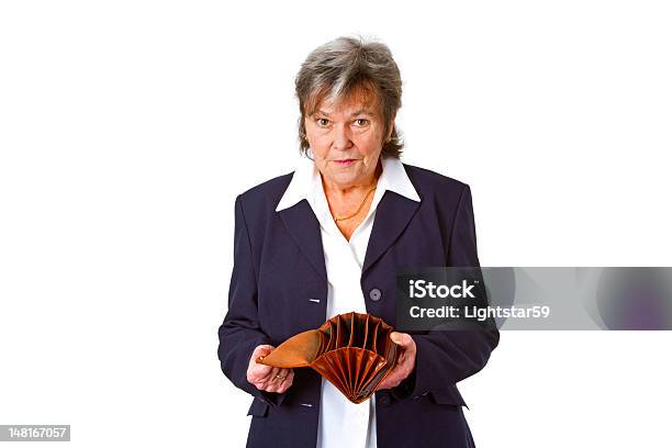 Female Senior Showing Empty Wallet Stock Photo - Download Image Now - Empty Wallet, Senior Women, Senior Adult