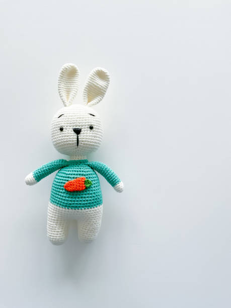 istock Soft white crochet bunny. on a white background. 1481676666