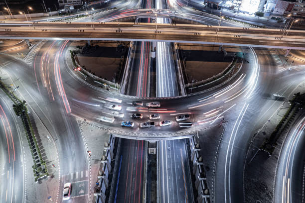 istock Expressway top view, Road traffic an important infrastructure, Drone aerial view fly in circle, traffic transportation, Public transport or commuter city life concept of economic and energ, transport. 1481677073
