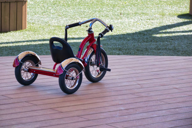 istock A cool red tricycle to ride in the park 1481677616