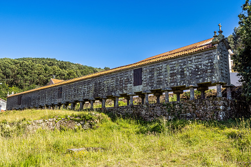 The long and narrow grain store, horreo at Lira in Galicia, Spain. This particular horreo is claimed to be one of the largest and original example and it is nearly 35 metres in length.