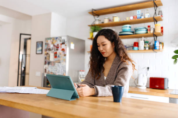 istock Beautiful woman working from home 1481684751
