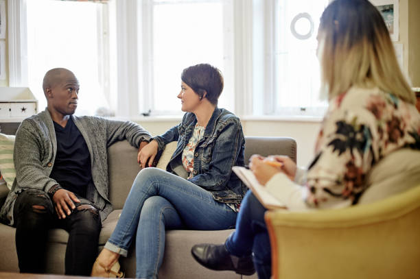 istock Marriage counselling, therapist and couple with problem, discussion and communication issues. Therapy, black man and woman in session, consultation and mental health with anxiety, fear and anxious 1481686862