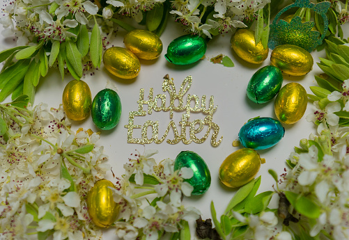 happy easter greetings with decorations and easter cakes