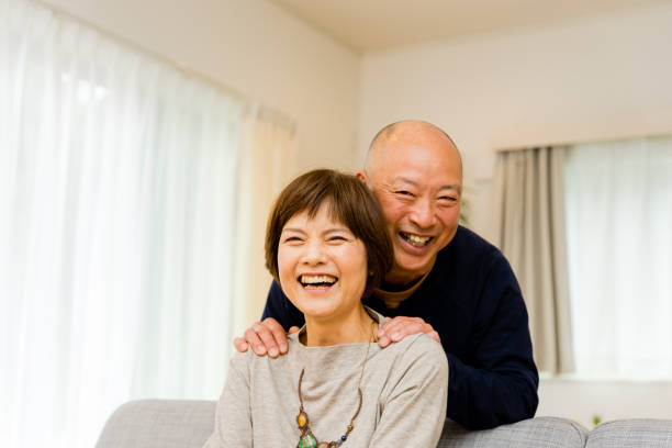 istock Husband wearing his hand on his wife's shoulder (a good senior couple) 1481694539