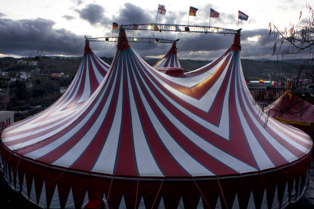 istock Striped circus red big top .  Sky background. 1481695407