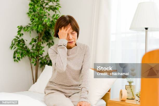 Women In Their 50s And 60s Who Have Their Heads Waking Up Stock Photo women-in-their-50s-and-60s-who-have-their-heads-waking-up-stock-photo