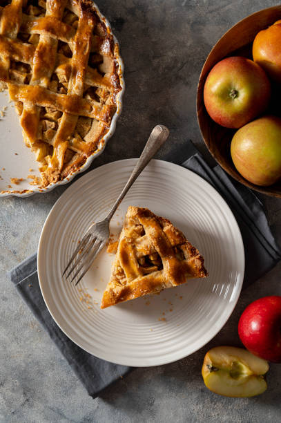 istock Slice of apple pie, homemade fresh fruit pie with red apples. 1481702731