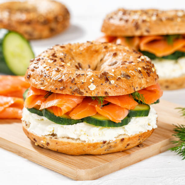 istock Bagel sandwich with salmon and cream cheese for breakfast square 1481705491
