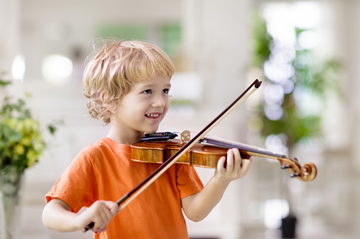 Child playing violin-Young musician