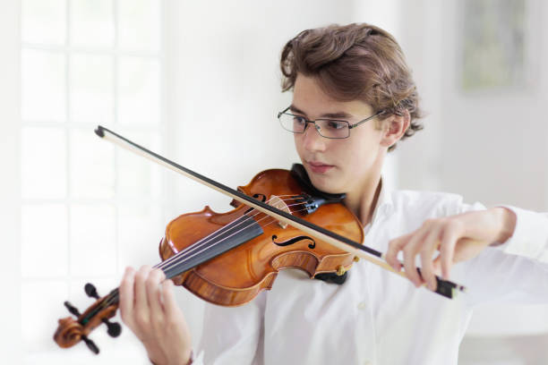 istock Man playing violin. Classical music instrument. 1481711782
