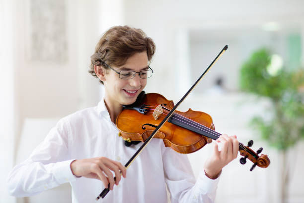 istock Man playing violin. Classical music instrument. 1481711870